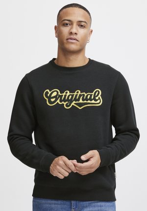 Zwarte sweatshirt van katoenmix, met een gestructureerd gouden "Original" logo. Regular fit met geribde manchetten en halslijn.