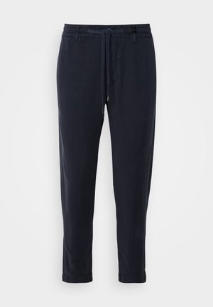Pantaloni leggeri di colore blu navy con una vita elasticizzata e cordoncino, caratterizzati da gambe affusolate e una texture liscia.