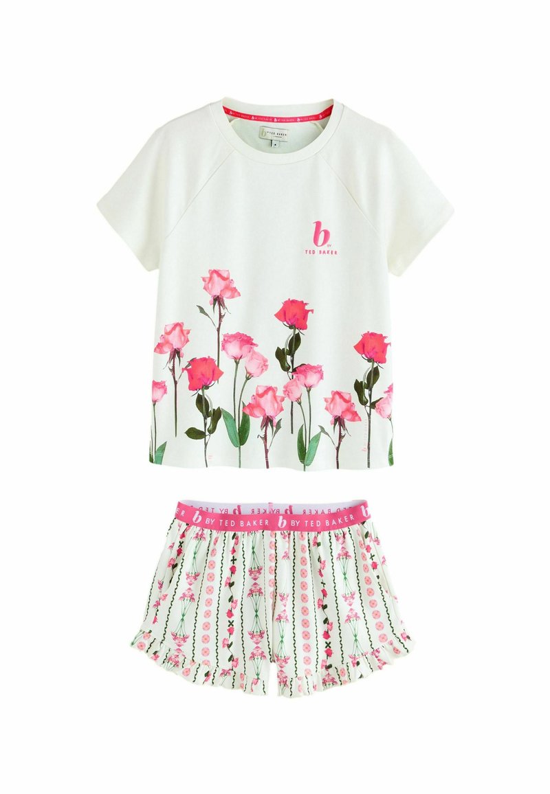 Korte mouwen witte top met een roze rozenprint en logo; bijpassende shorts met een roze tailleband en bloemenpatroon op een witte achtergrond.