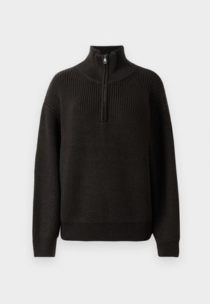 Musthave mustern lülita puhviga musta kampsun, millel on kõrge krae ja poolsepp. Omab tekstureeritud kangast ja soonikkäiseid. Lahtine lõige sirge äärisega.