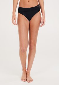Slip di bikini nero a coste con una cintura larga, gambe alte e texture liscia. Presenta un discreto dettaglio del marchio sulla cintura.