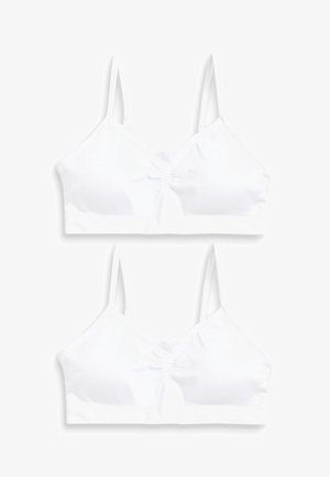 Bralette de algodón blanco con tirantes ajustables, centro ligeramente fruncido y sin aros, que presenta una textura suave y un diseño sencillo.