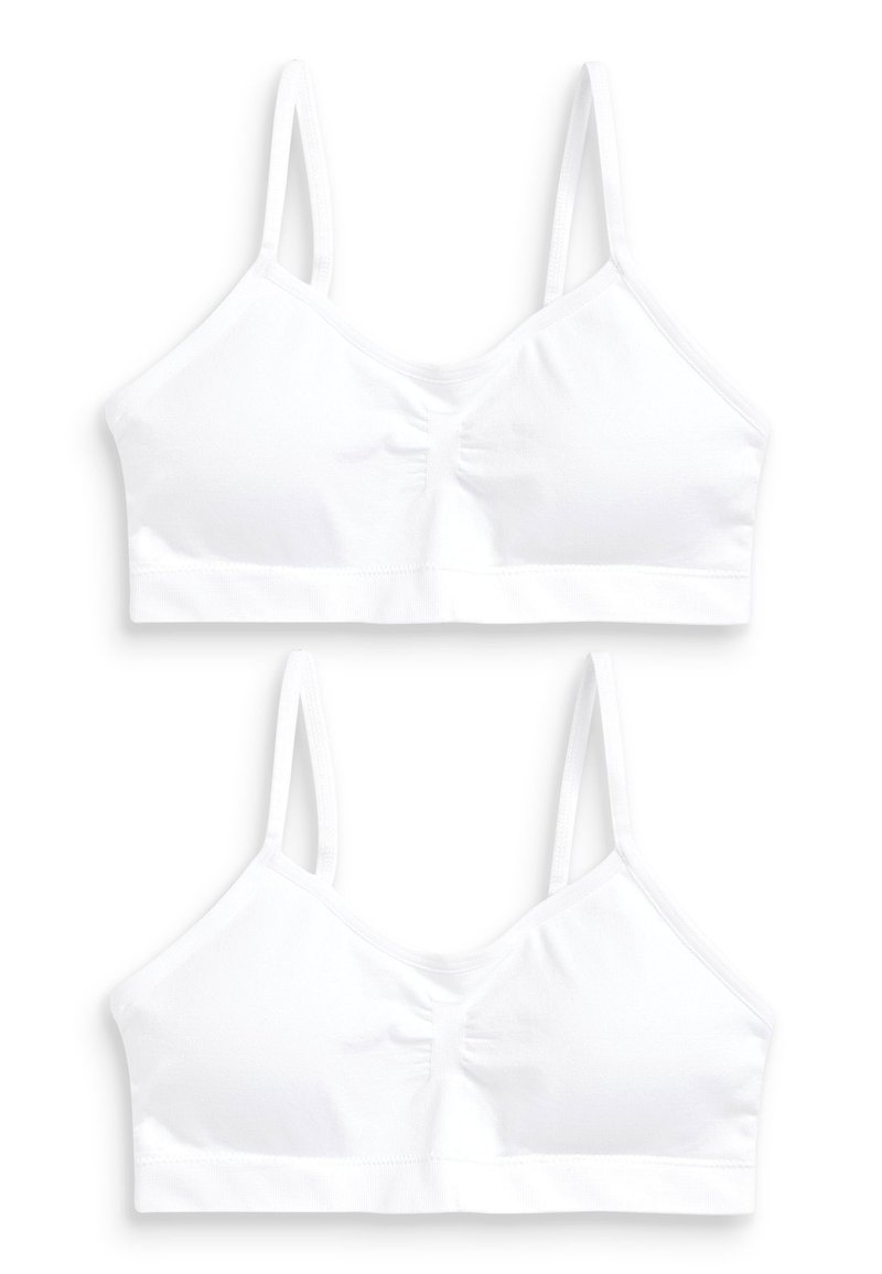 Hvid bomuldsbralette med justerbare stropper, let samlet midte og uden bøjle, som har en glat tekstur og et enkelt design.