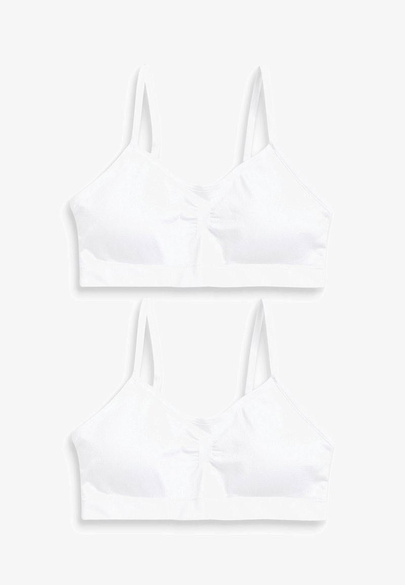 Fehér pamut bralette állítható pántokkal, enyhén ráncolt középponttal és merevítő nélküli kialakítással, sima textúrával és egyszerű dizájnnal.