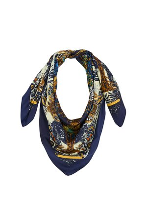 Pañuelo cuadrado de seda con patrones florales y de hojas en colores azul marino, crema, azul y marrón, doblado con un nudo en la parte superior.