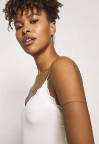 MAGIC Bodyfashion COZY ORGANICS CAMI - Top - snow white