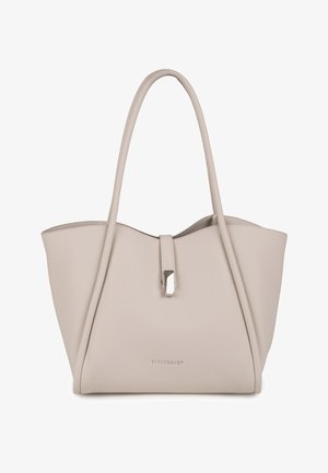 Jasnobeżowa skórzana torba typu tote z podwójnymi uchwytami i przednim paskiem z srebrną prostokątną klamrą.