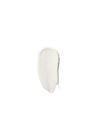 Krämig vit kosmetisk produkt applicerad i ett mjukt, böljande drag med en blank yta, mot en enfärgad vit bakgrund.