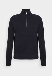 Marinblå stickad tröja med hög krage, halvdragkedja framtill och ribbade ärm- och nederkanter. Slät textur med en klassisk passform och inga synliga mönster.