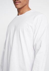 Carhartt WIP BASE - Langærmet T-shirt - white/black