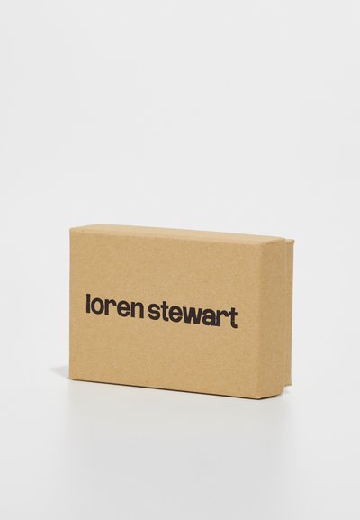 Brown kraft paper box with a rectangular shape, featuring the printed text "loren stewart" in bold black letters on the front.