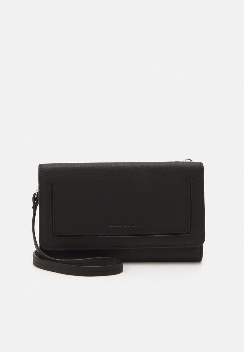 Black leather wristlet wallet with flap closure and subtle brand name embossing on the front, resting on white background.