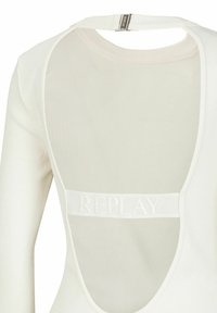 Weißes, geripptes Top mit einem Scoop-Rücken und einem Netzpaneel mit "REPLAY"-Markenlogo. Das Design umfasst einen Reißverschlussverschluss auf der Rückseite.