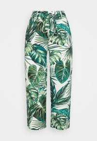 Pantalon à imprimé tropical en tissu léger, présentant des motifs de feuilles vertes et bleu sarcelle sur fond blanc, avec une taille à cordon de serrage.