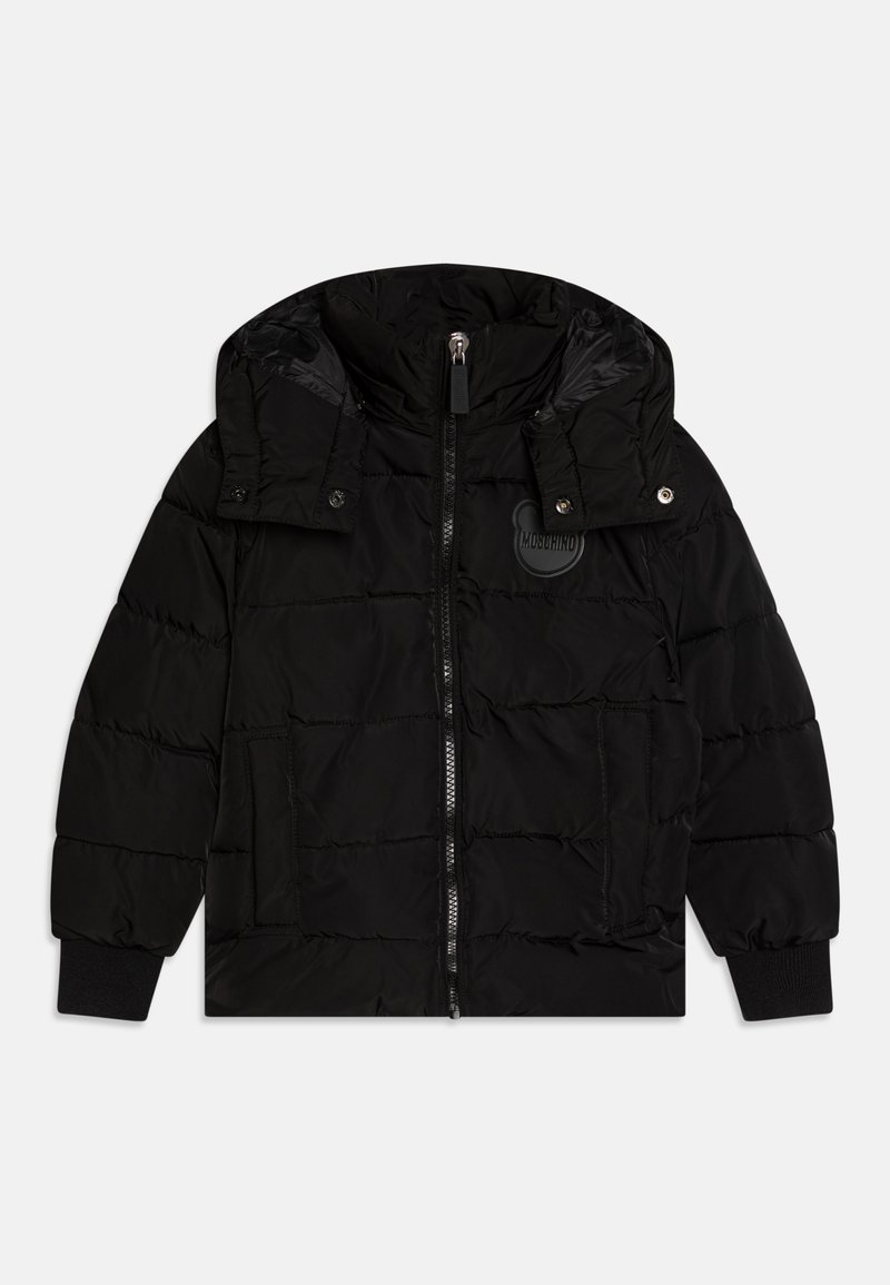 Black puffer jacket with a zip front, adjustable hood, and ribbed cuffs. Features vertical quilted texture and a logo patch on the chest.