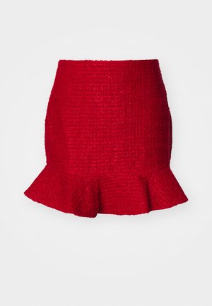 Rød teksturert mini-skjørt med volangkant. Laget av vevd stoff, har en tettsittende silhuett og subtilt mønster gjennomgående.