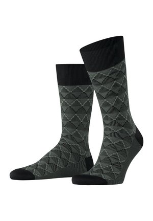 Chaussettes noires et vertes foncées avec un motif géométrique, des côtes aux poignets et des zones de renforcement aux orteils et au talon pour une durabilité accrue.