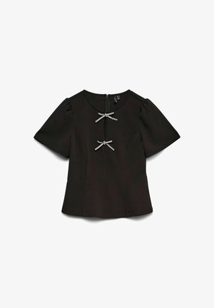 Črna bluzica s kratkimi rokavi in napihnjenimi rokavi, ki ima spredaj dve okrasni sivi pentlji in zadrgo na hrbtu. Gladek material.