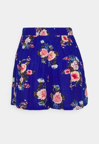 Shorts bleus à fleurs avec une taille élastique, présentant un motif de roses roses et blanches, agrémenté d'accents verts et marron.