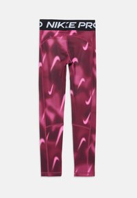 Nike Pro leggings, rózsaszín és bordó mintázattal, absztrakt vonalakkal és ismétlődő logóelemekkel; testhezálló kialakítás, elasztikus derékpánttal.