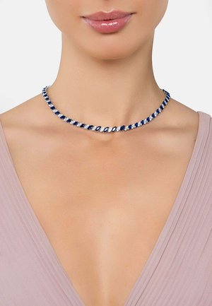 Sapphire and white stone necklace featuring alternating marquise-cut stones, set in silver. It has a smooth, polished finish and flexible design.