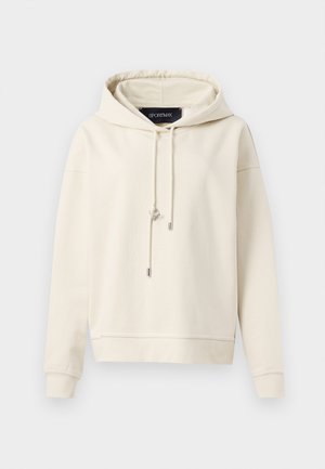Hoodie de couleur crème en tissu doux, doté d'une fermeture à cordon de serrage, de poignets côtelés et d'une coupe décontractée. Aucune graphique ni motif présent.