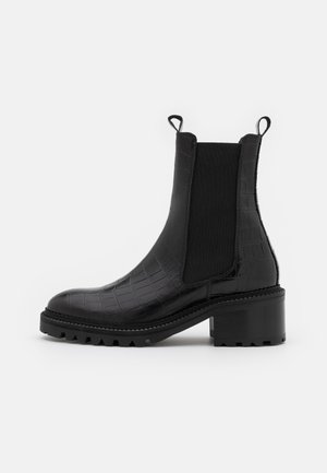 Botines con plataforma - black