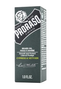 Grön och svart förpackning för Proraso skäggolja med ett lejonemblem. Texten inkluderar "Cypress & Vetyver", 1,0 fl. oz., och produktinformation.