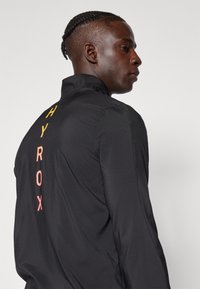 Puma HYROX RUN JACKET - Jakna za treniranje - black