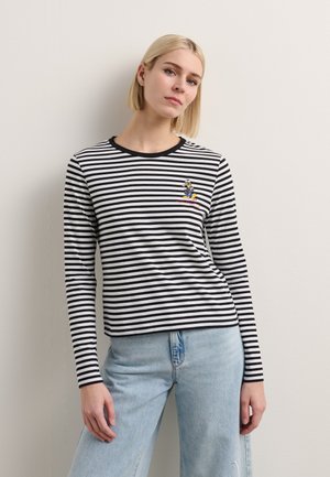 Long-sleeve striped shirt in black and white cotton with a round neckline, featuring a cartoon character embroidered on the left chest.
