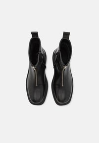 Zign - Botki na platformie