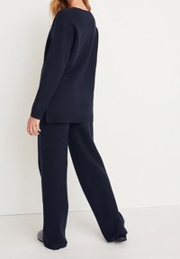 Next Sweter