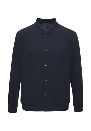 Navy blue jacket with a stand collar, snap buttons, elasticized waistband, and side pockets; smooth texture and minimal design.