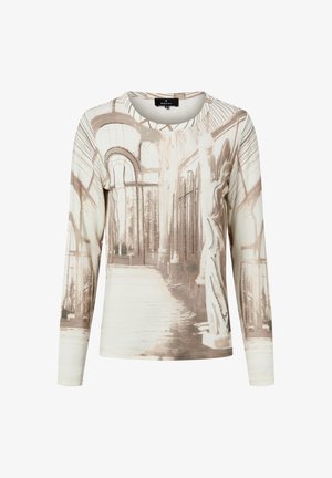 Long-sleeve beige top with sepia-toned architectural print of arched windows and statues, featuring small decorative studs along some outlines.