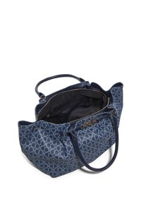 Navy blue tote bag with patterned exterior, two handles, and a zip closure. Interior features a black lining and a small pocket.
