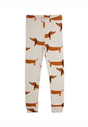 Børns beige leggings med et gentagende tegneseriemønster af brune gravhunde, der vender til venstre og højre.