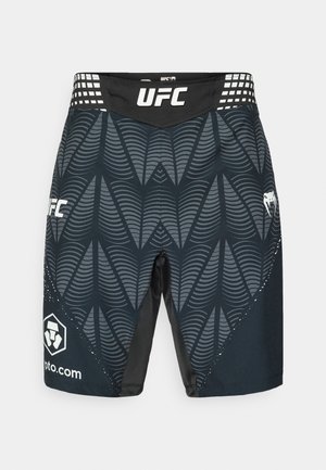 Black and grey UFC shorts feature a textured wave design, a solid color waistband, and logos on the sides, optimized for athletic movement.