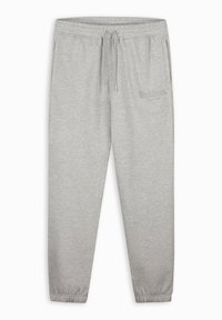 Grijze sweatpants met een elastische tailleband en trekkoord, zijzakken en geribbelde boorden. Zachte textuur met een subtiele logo-detail.