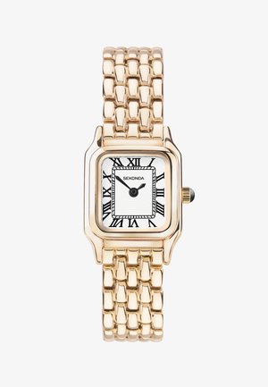 Montre rectangulaire dorée avec un cadran blanc texturé, des chiffres romains noirs et un bracelet en métal relié. Dispose d'une couronne ronde.