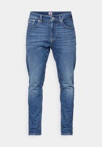 Modré denimové džíny slim fit, s knoflíkovým zapínáním, pěti kapsami a jemným vyblednutím. Název značky na pásku.