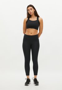 Röhnisch KAY HIGH WAIST T - Leggings - black black