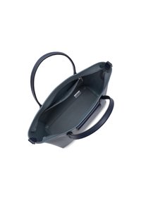 Sac à main intérieur bleu avec des poignées en cuir, ouverture en haut, matériau extérieur texturé et poche zippée intérieure pour le rangement.