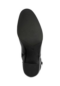 Sole di scarpa nera con superficie in gomma texture, punta arrotondata e tacco stretto. Presenta una marcatura di misura (37) vicino all'area del tacco.