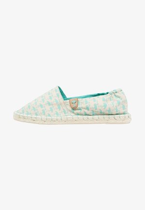 Espadrille-style slip-on shoe, featuring a light beige fabric with turquoise pattern, decorative tan logo tab, and woven jute outsole.