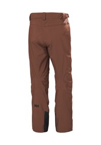 Bruine waterdichte broek met een gladde textuur, verstevigde zwarte onderzoom, en subtiele branding op de bovenbeen en taille, ontworpen voor gebruik buitenshuis.