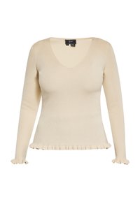 Cremefarbener, gerippter Pullover mit langen Ärmeln, V-Ausschnitt und volantsäumo und -manschetten, aus weichem Material für Komfort und Flexibilität.