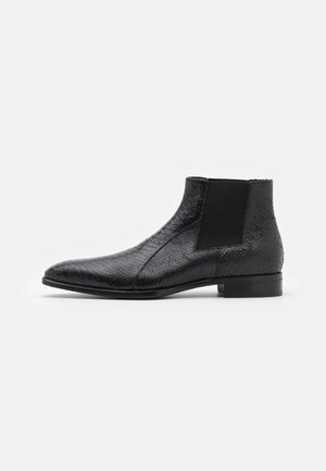 Bottines - pitone nero