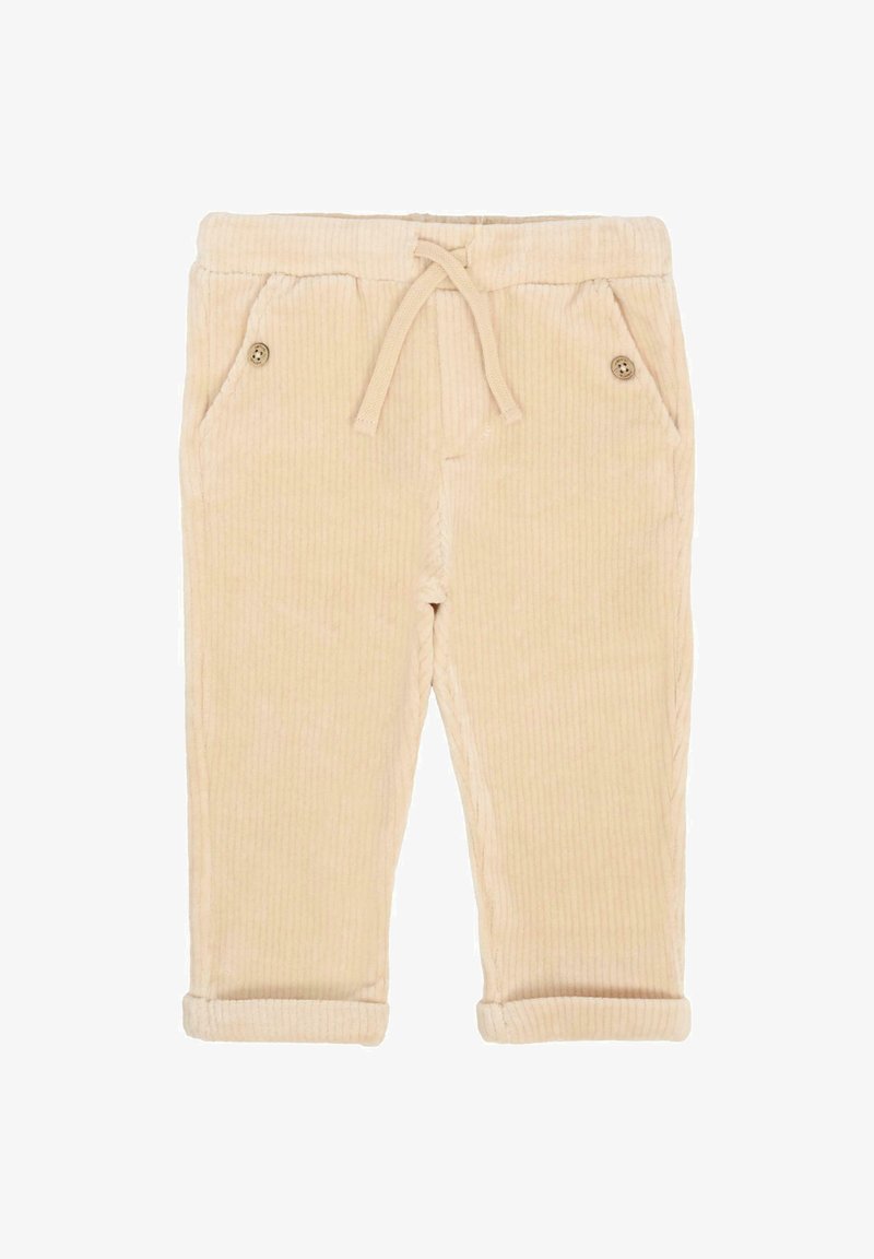 Beżowe spodnie z korduroy z elastycznym pasem, dwiema przednimi kieszeniami z guzikami i podwiniętymi nogawkami dla lepszego dopasowania.