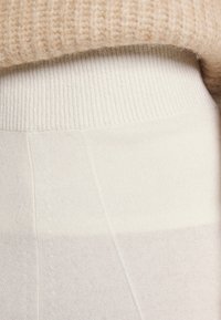 pure cashmere LOOSE FIT PANTS - Calças - vintage white