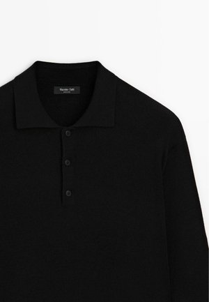 Black polo shirt featuring a classic collar, three-button placket, and soft texture, designed with a straight hem and clean lines.